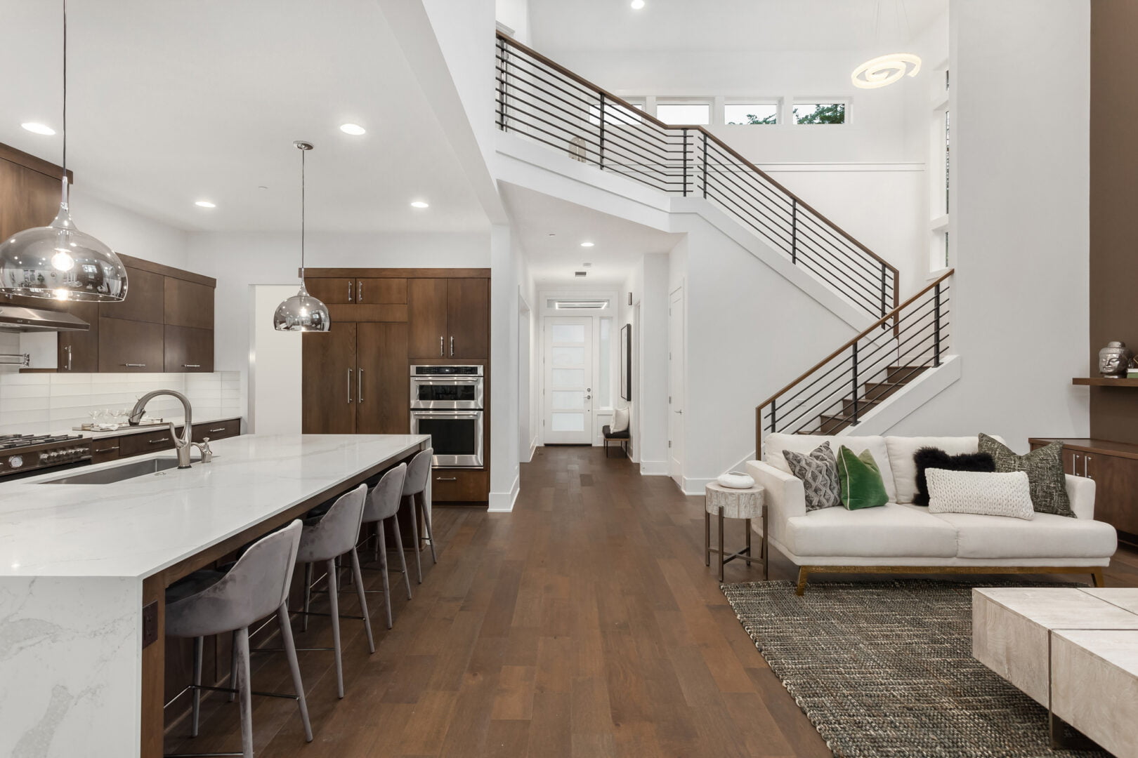 kitchen and living room in newly constructed luxury home